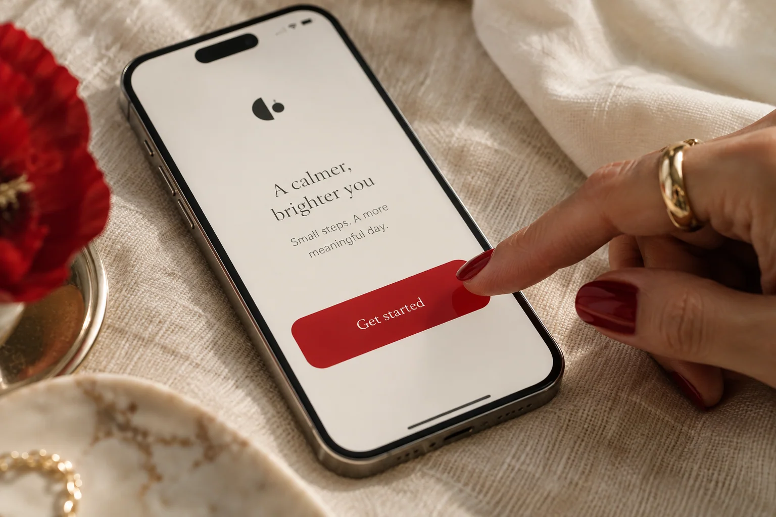 A hand selecting one clear scarlet action button on a phone