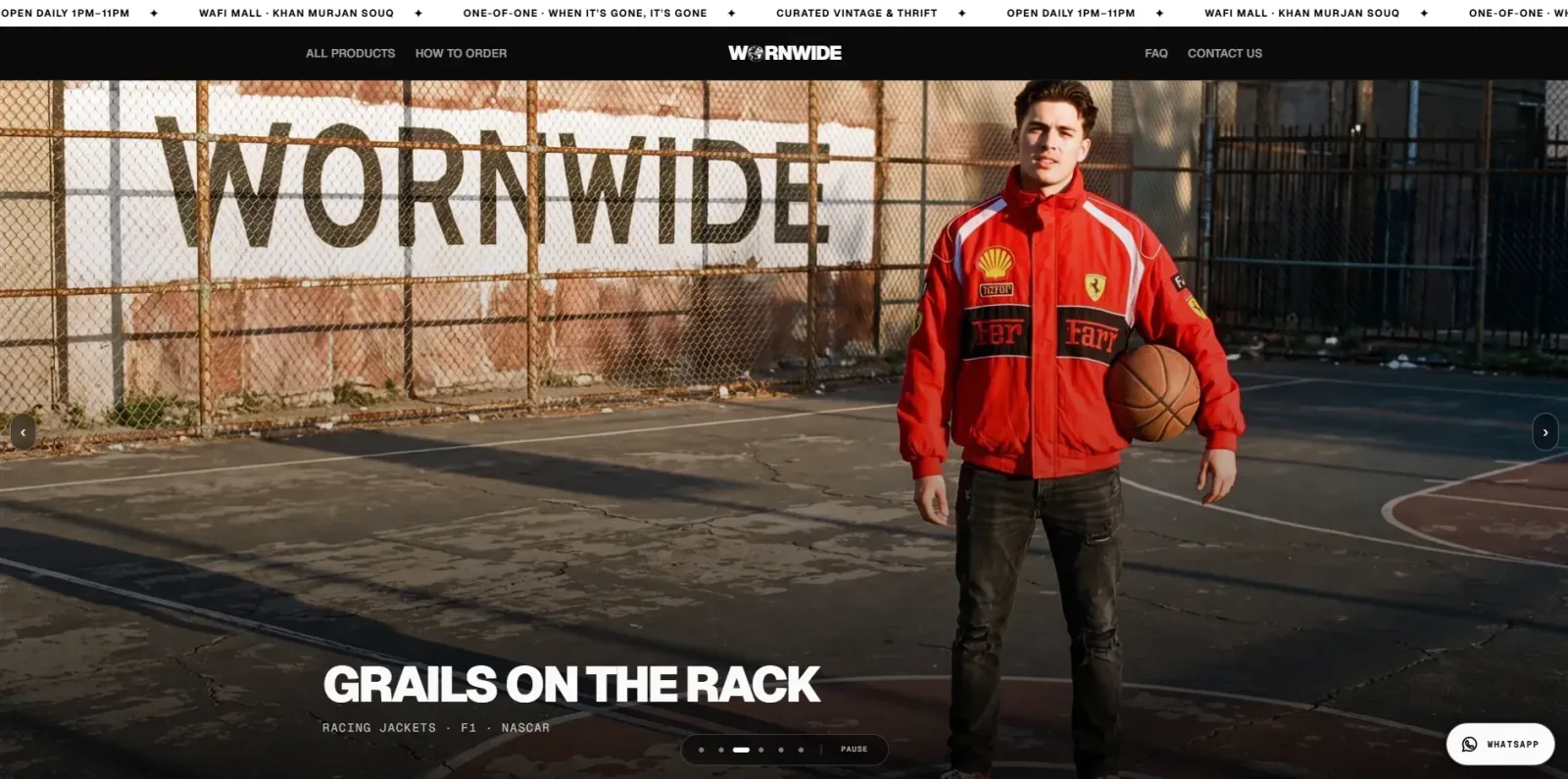 Wornwide homepage hero reading “Grails on the Rack” with a man in a red Ferrari racing jacket on a basketball court